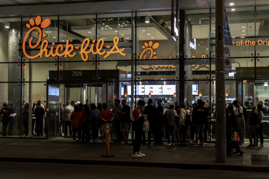 Sign of Chick-fil-A restaurant in the night in Toronto, Canada. 