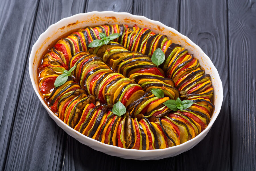 Traditional French cooked provencal vegetable dish - Ratatouille . Food background