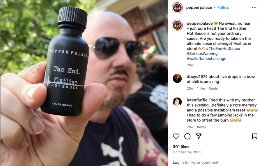 Instagram post of a man holding a bottle of "the End" hot sauce, by @pepperpalace