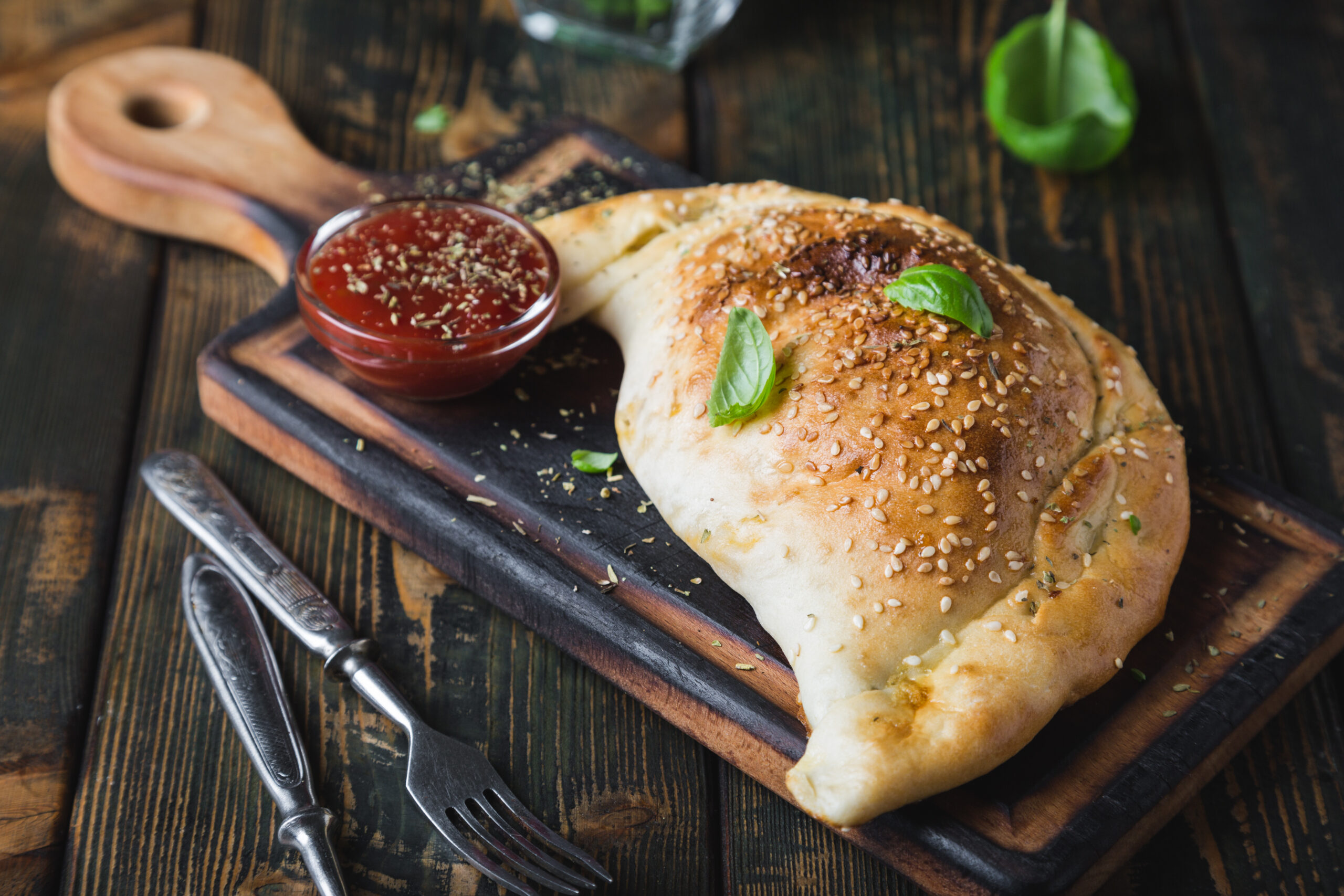 Calzone pizza with chicken and cheese