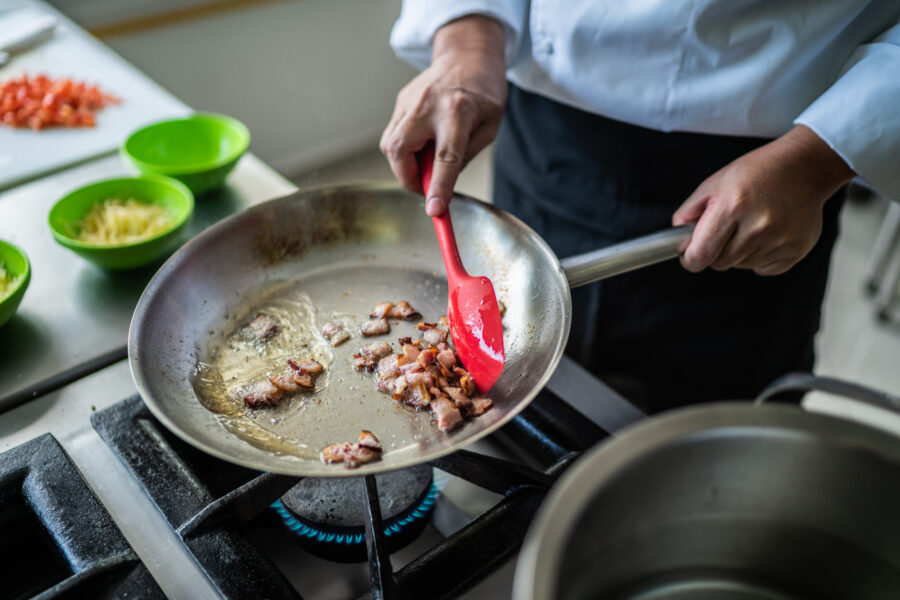 Chef preparing food in a commercial kitchen