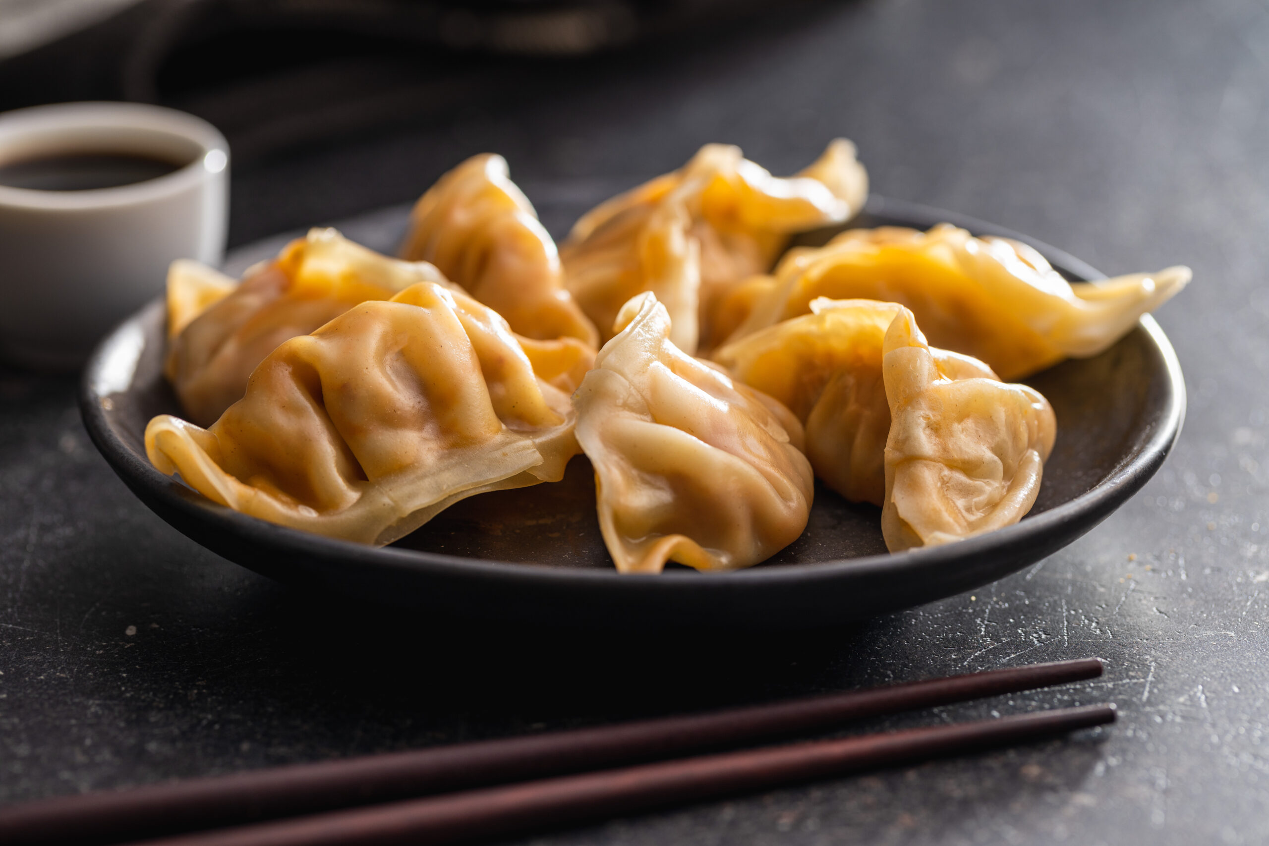 Chinese dumplings on a plate.