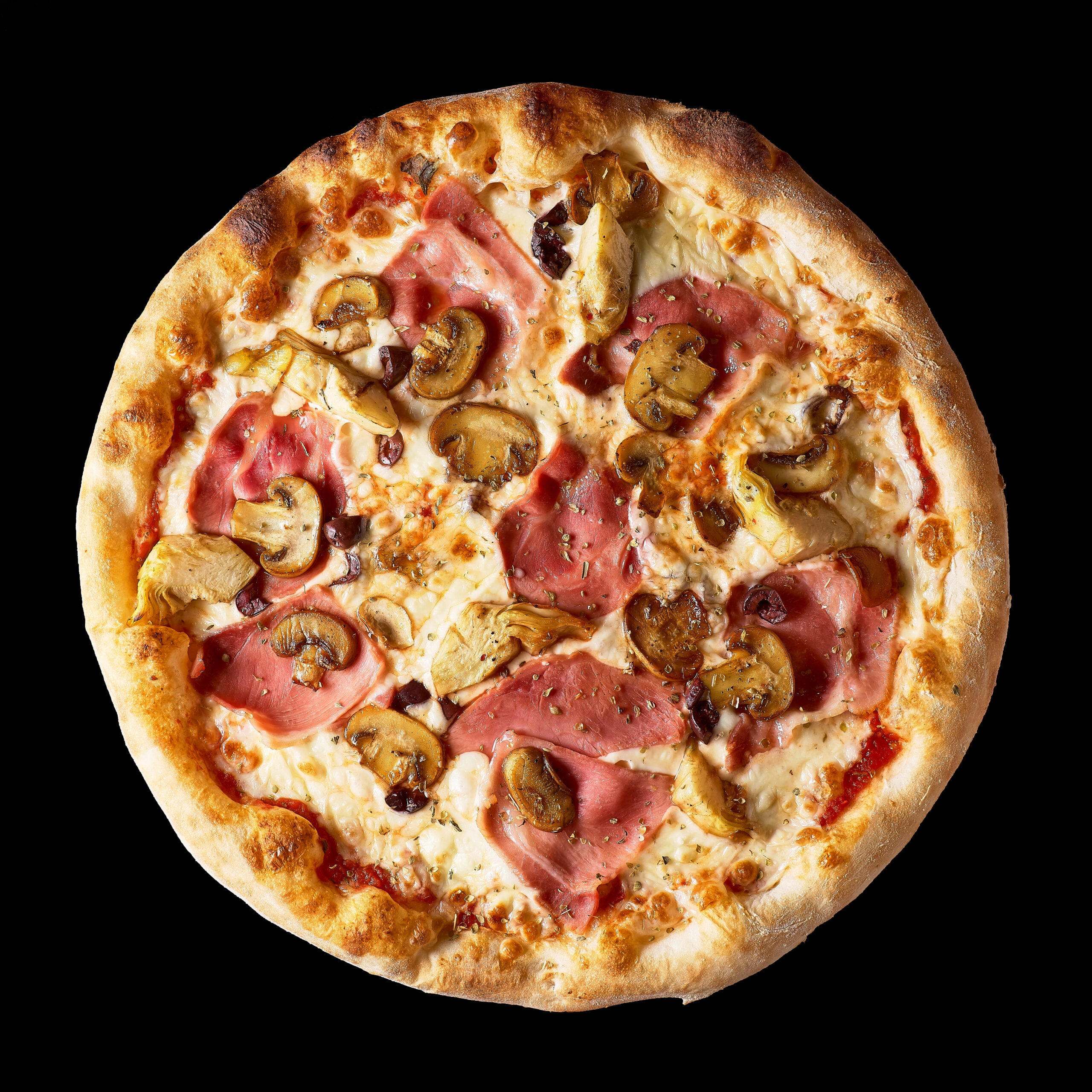 Fresh Italian pizza with , pastrami, ham, mushrooms restaurant menu, isolated an on isolated black background. Top view