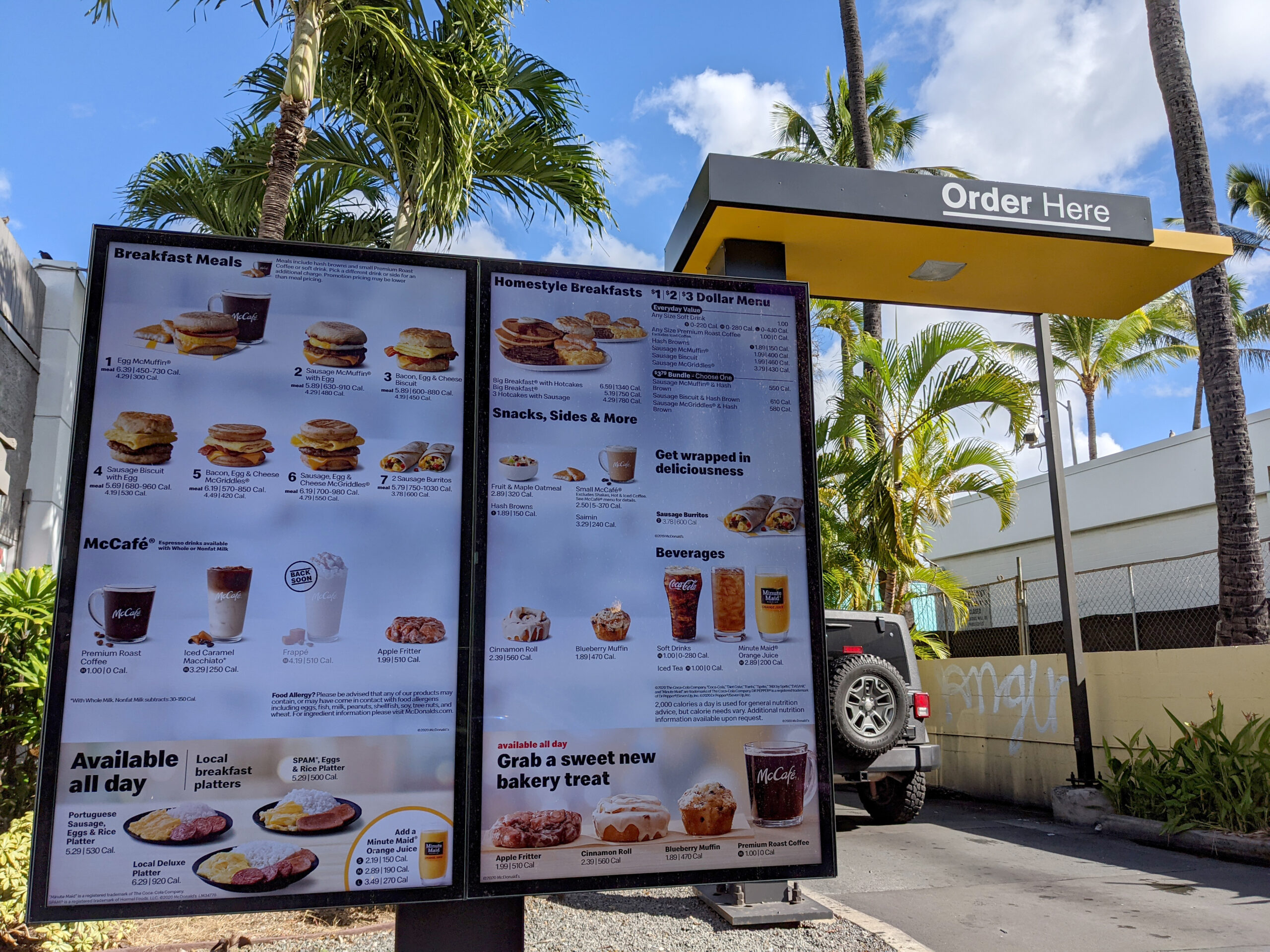 Honolulu - December 10, 2020: Digital Menu at McDonalds Drive Thru Lane.