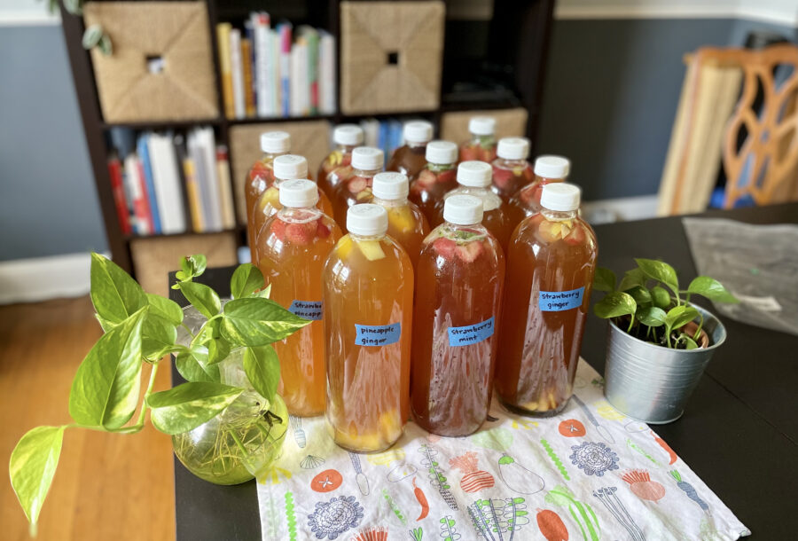 multiple bottles of colorful, flavored kombucha