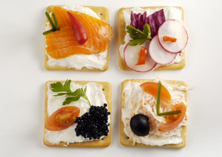 Salmon, caviar, cheese, served on crackers