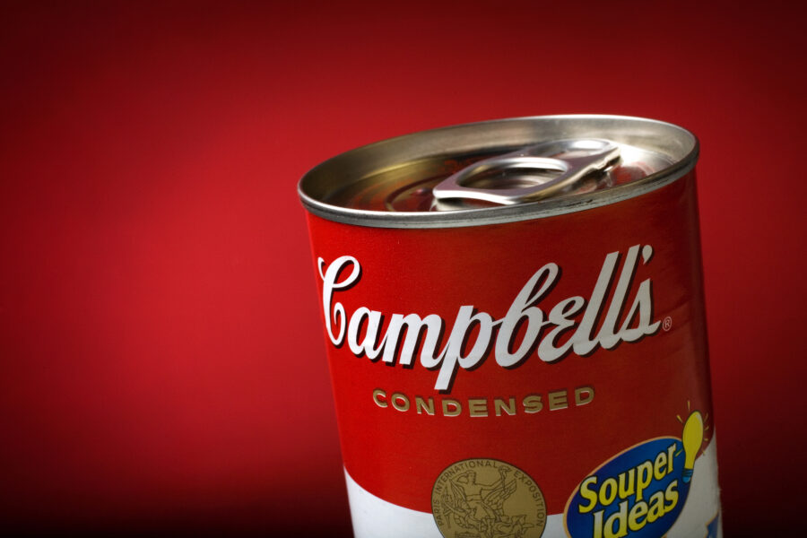 Classic Campbell's Condensed Soup Can registered on a red background. 