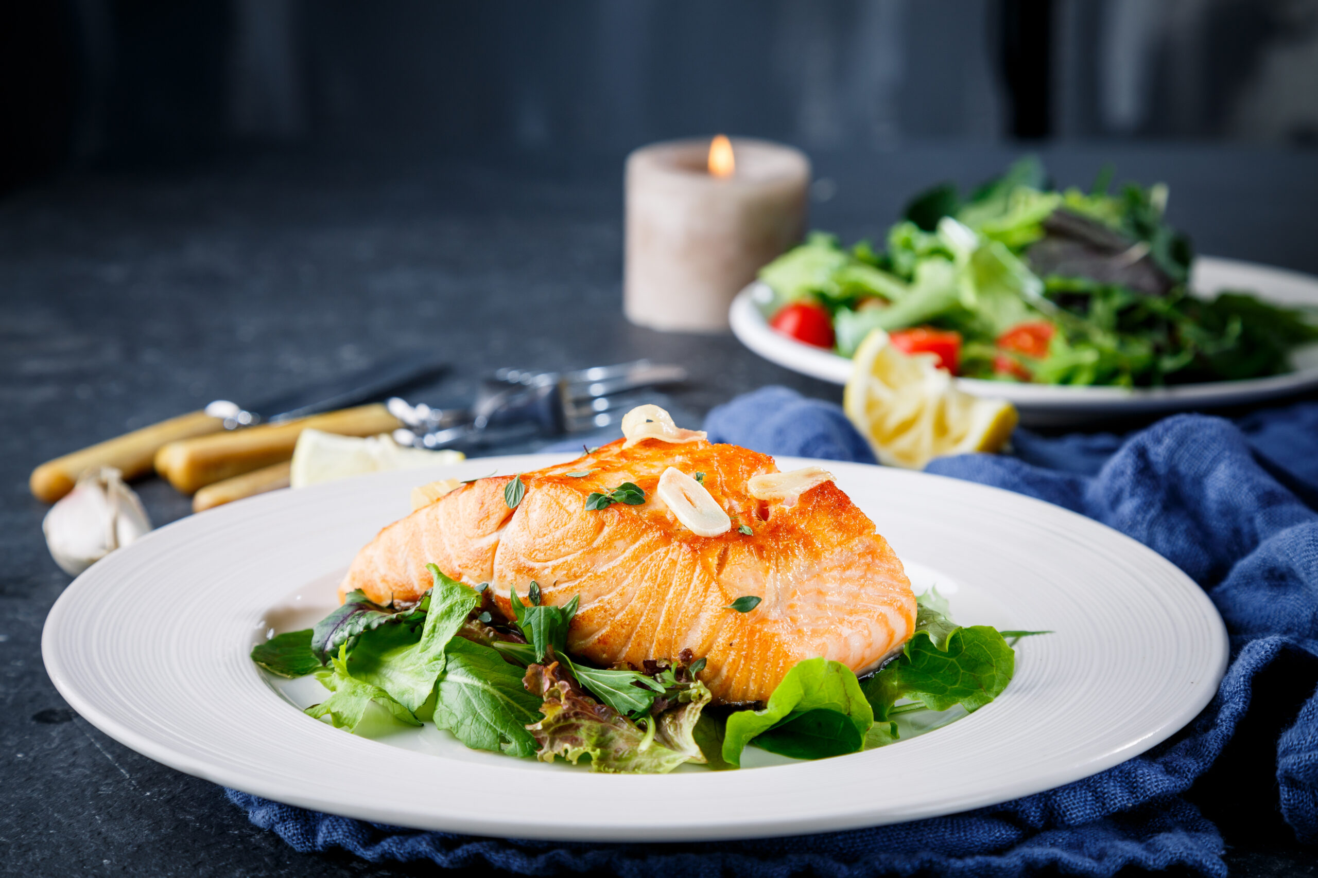 Salmon fish on white plate