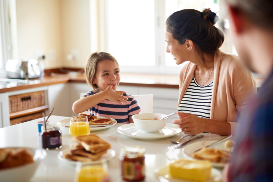 Shot of a family having breakfast together