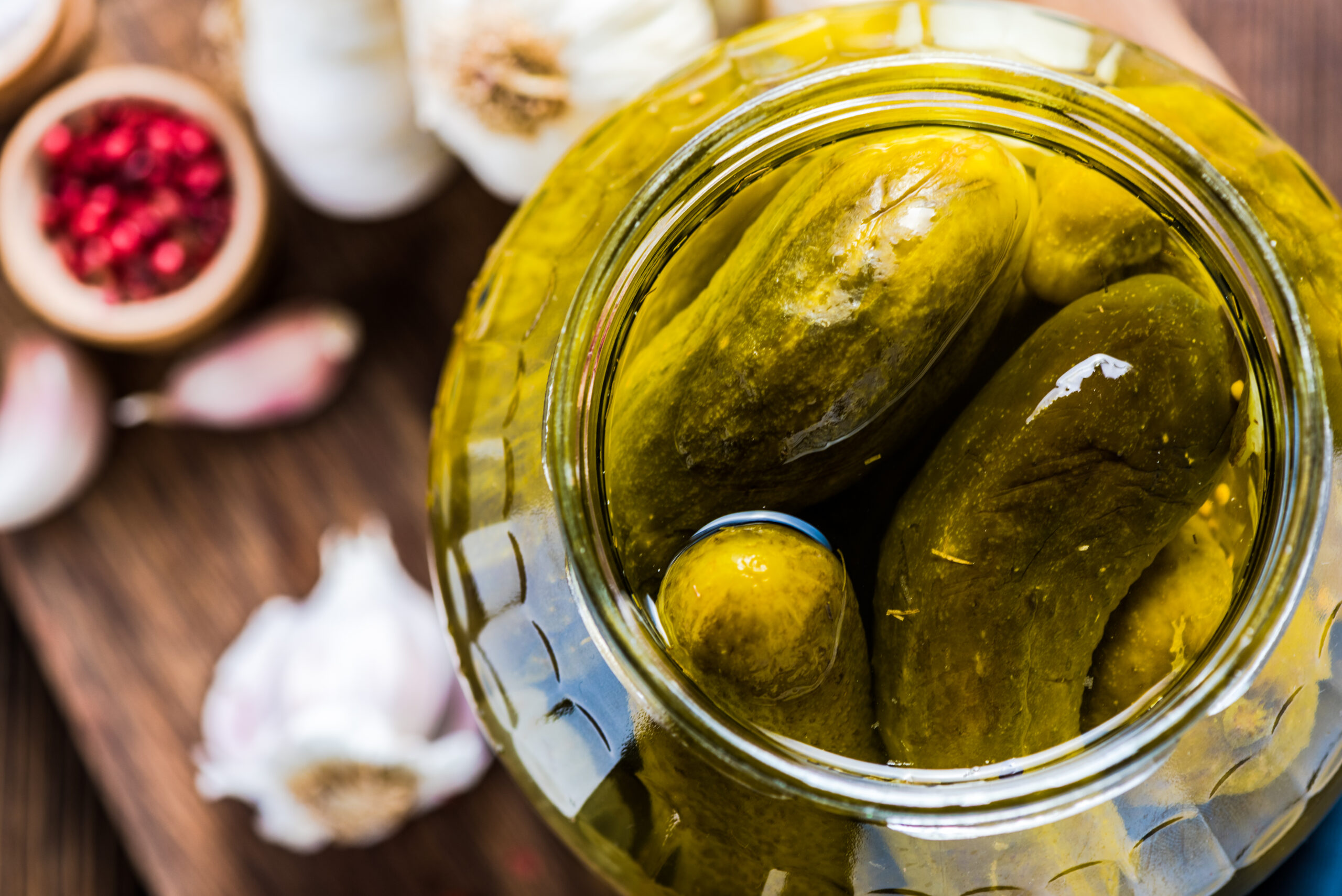 Pickled gherkins in jar, fermented food with spices