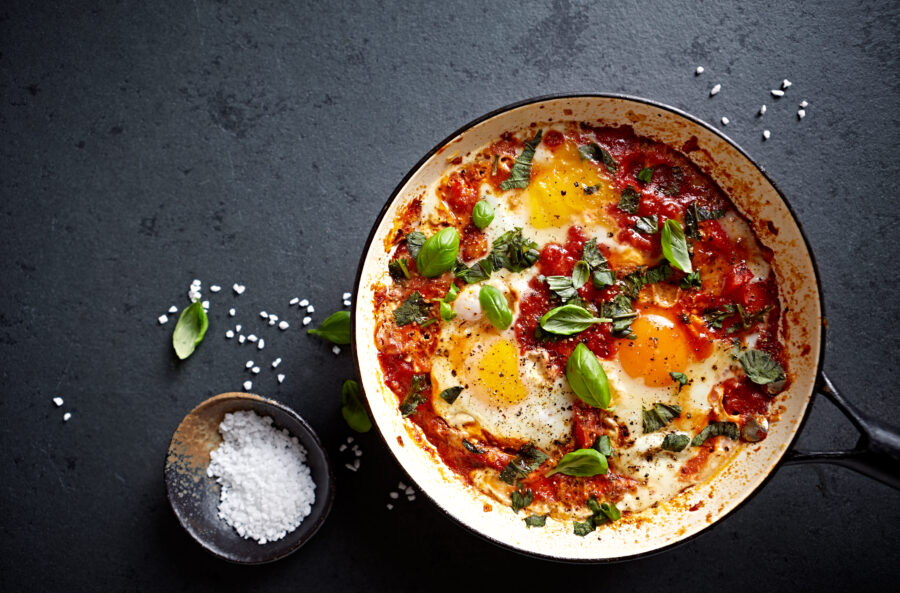 Shakshouka Eggs (poached eggs in a spicy tomato sauce)