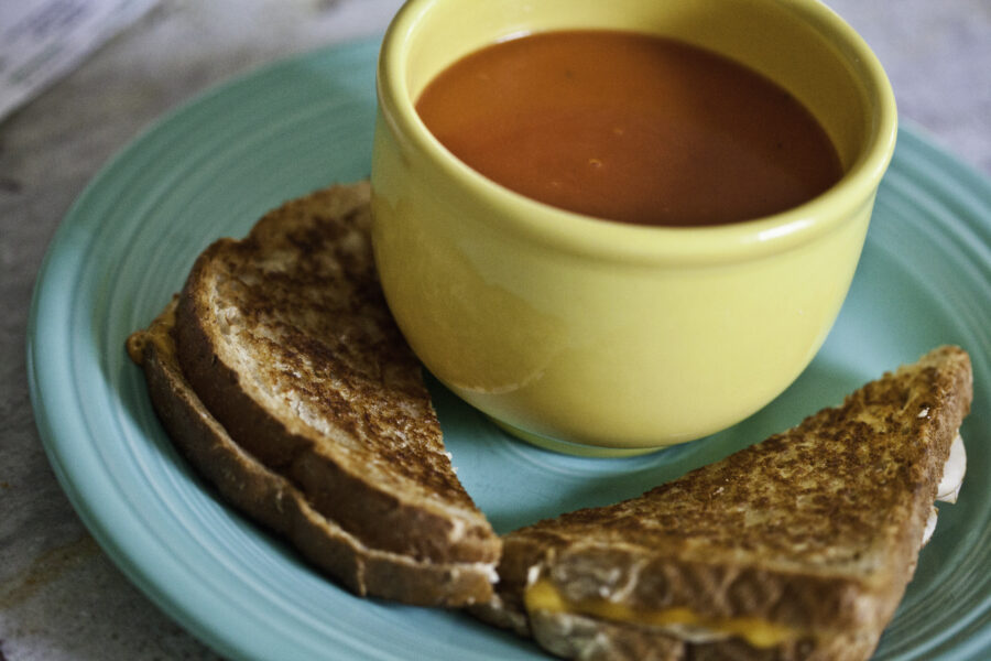 Tomato Soup in yellow bowl, Grilled Cheese sandwich