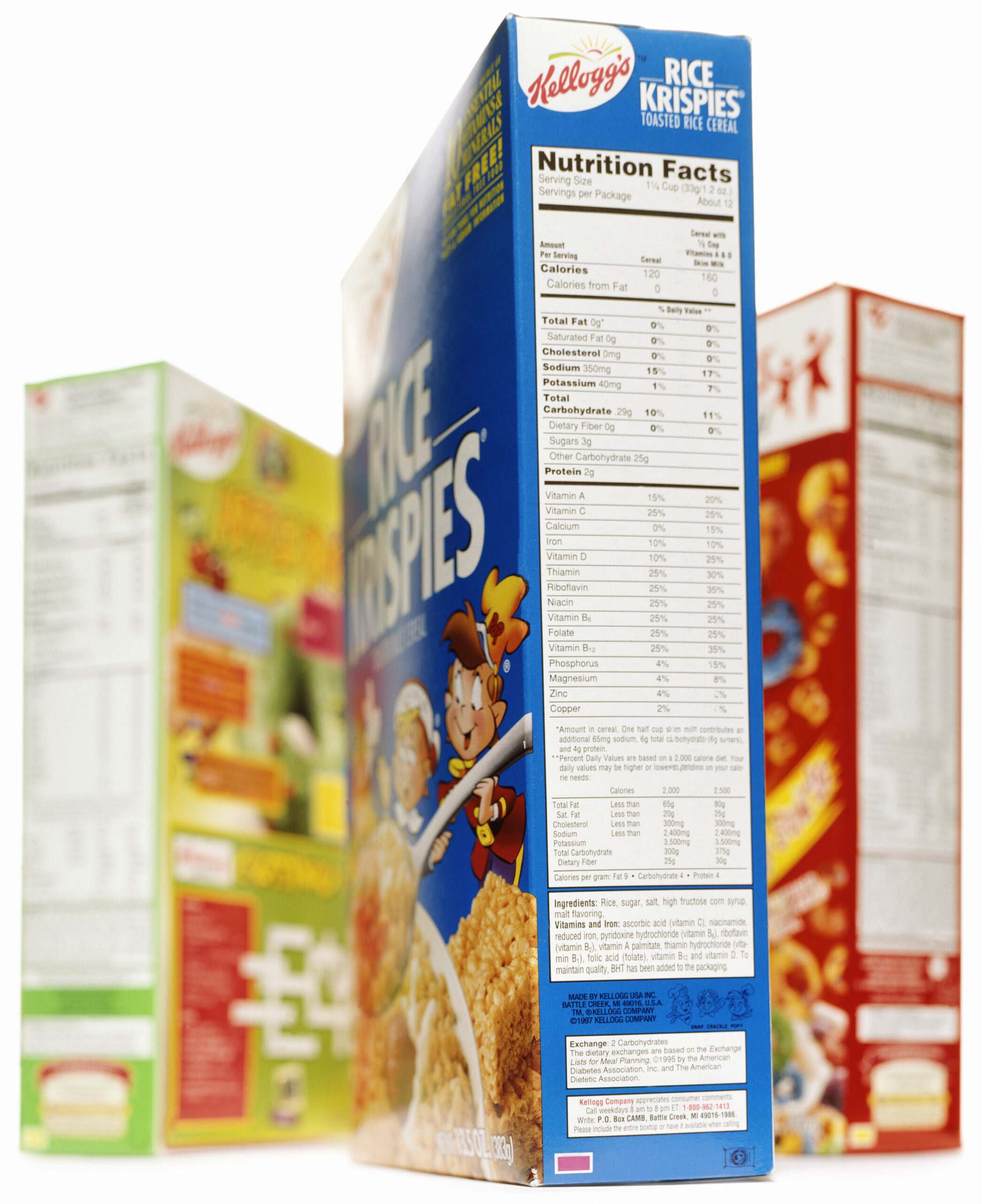 Truro, MA - October 26, 2011: Three boxes of cereal produced by Kellogg Company including  Rice Krispies, Apple Jacks and  Fruit Loops. The Kellog Company is based in Battle Creek, Michigan, United States. Photograph is focused on the nutrition facts.