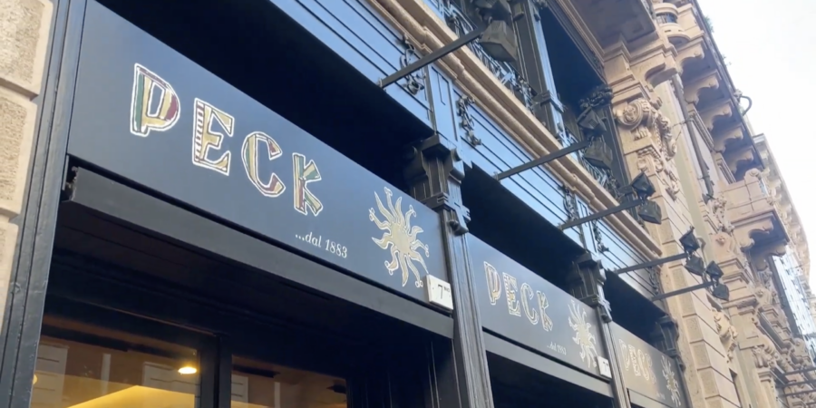 Sign for Peck market in Milan, posted to YouTube by Walking Together