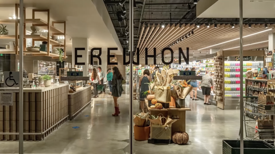 Erewhon logo on glass doors, from YouTube video by Business Rise