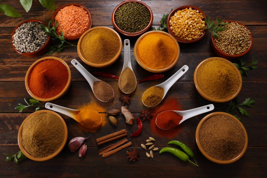 A selection of herbs and spices including Red and Green Chilli Turmeric Cumin Garam Masala 