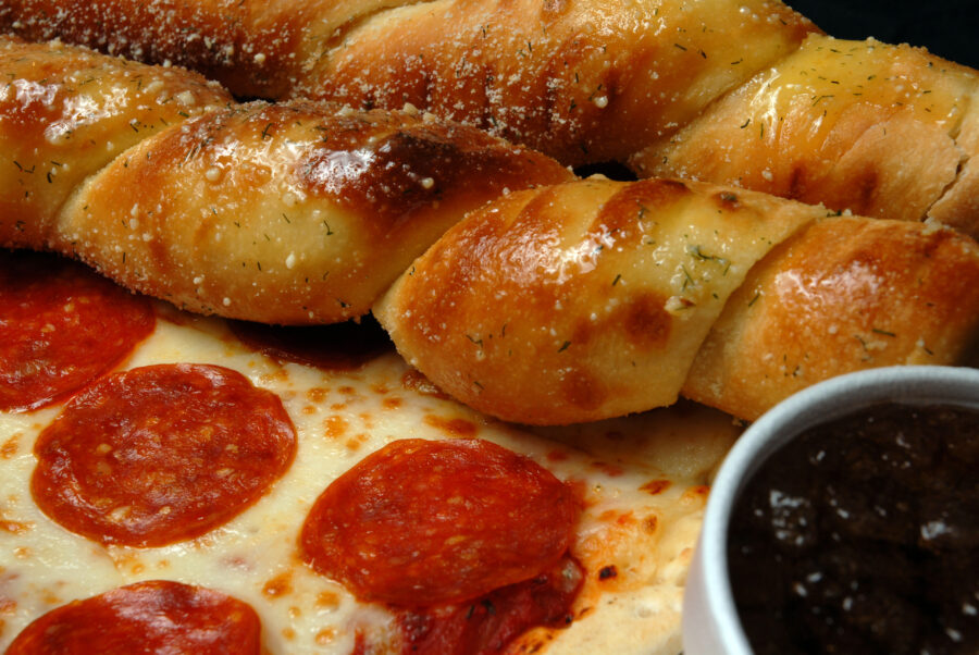 Pizza, Bread twists, and a Drink.