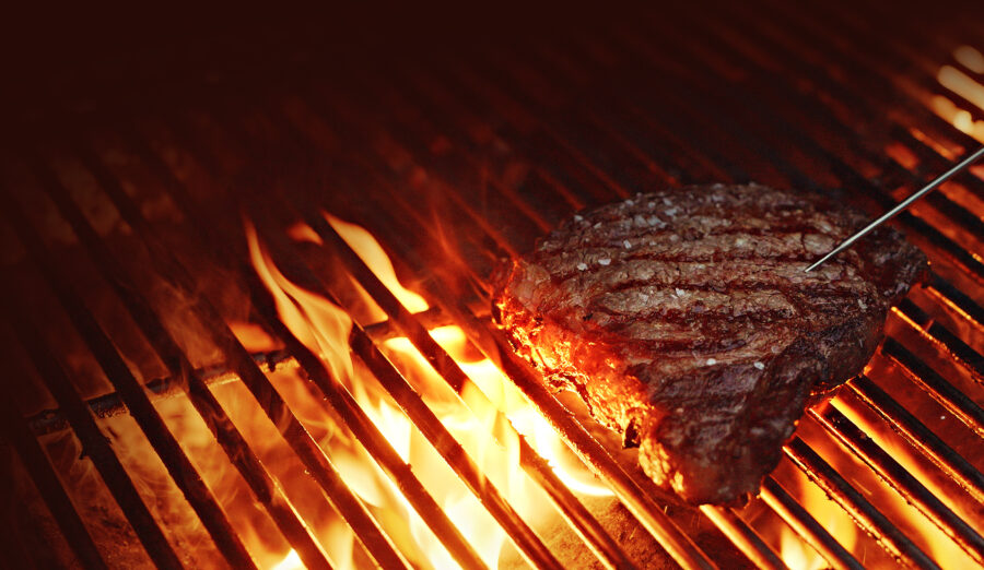 Rib-eye Steak on a BBQ