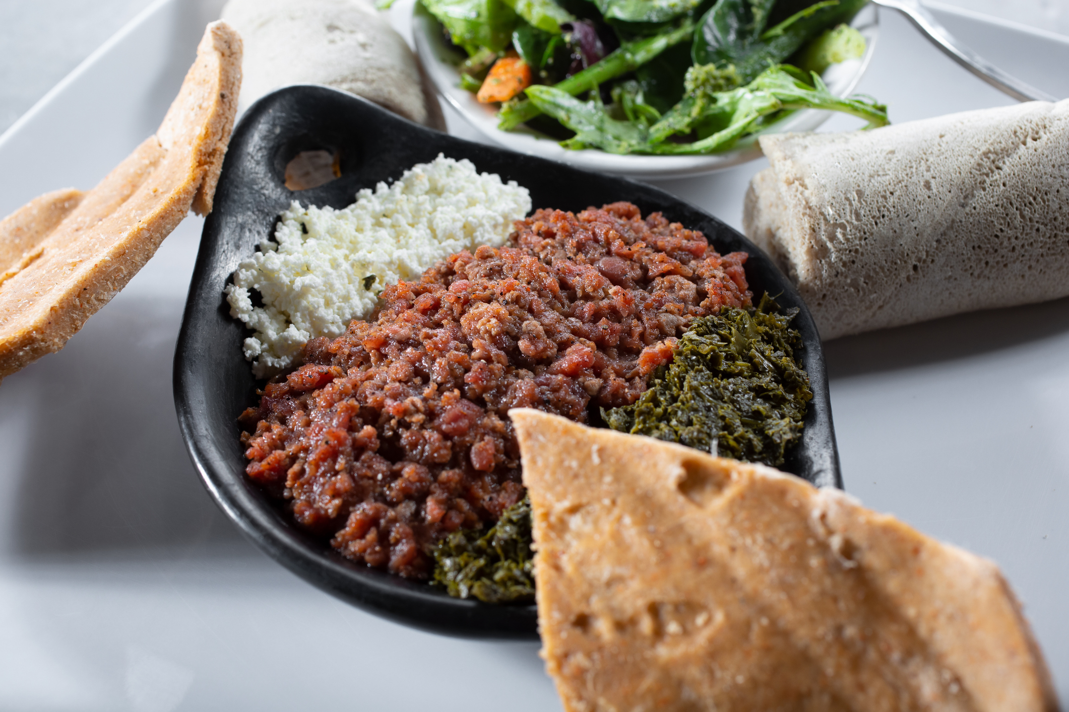 A view of a bowl of kitfo.