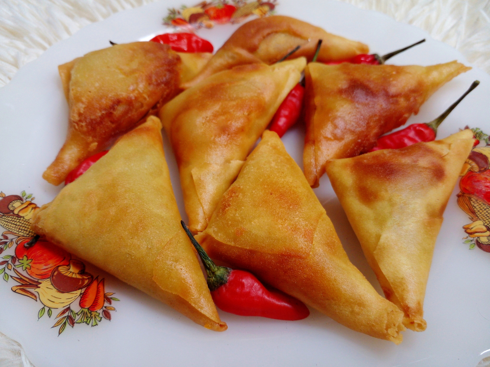 Samosa or sambosa stuffed with some filled like vegetables or beef.