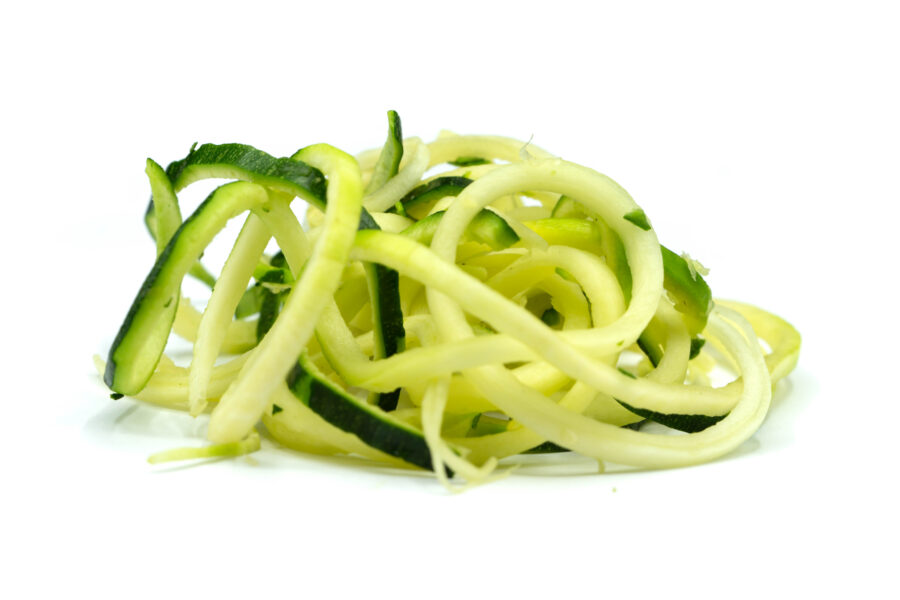 Zucchini strips isolated on white background