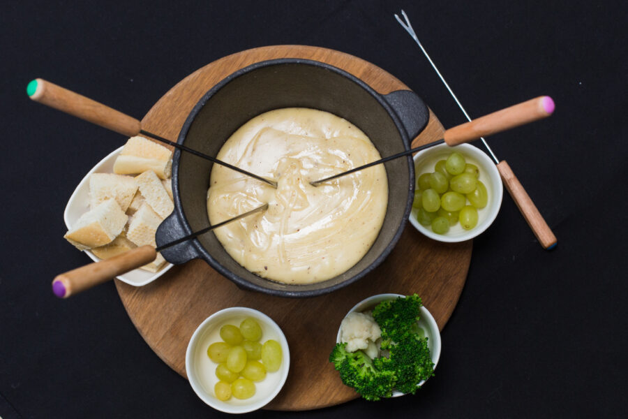 A cheese fondue on a table top