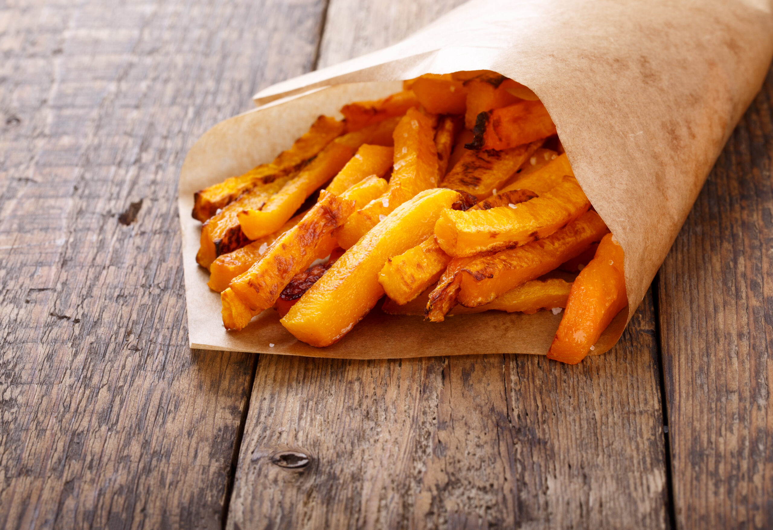 Baked butternut squash fries with sea salt. Pumpkin chips.