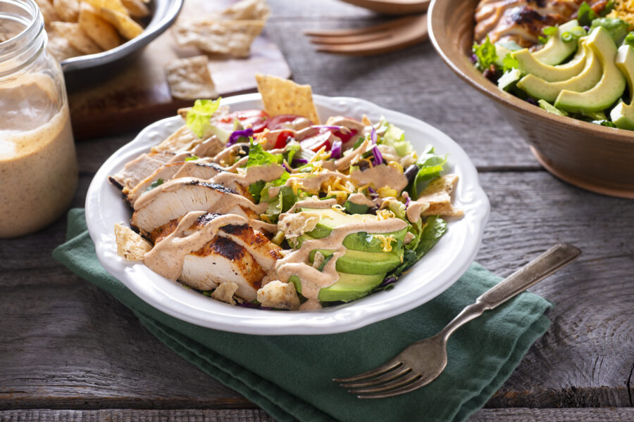 Bowl of Southwestern Chicken Chopped Salad with Homemade Spicy Ranch Dressing