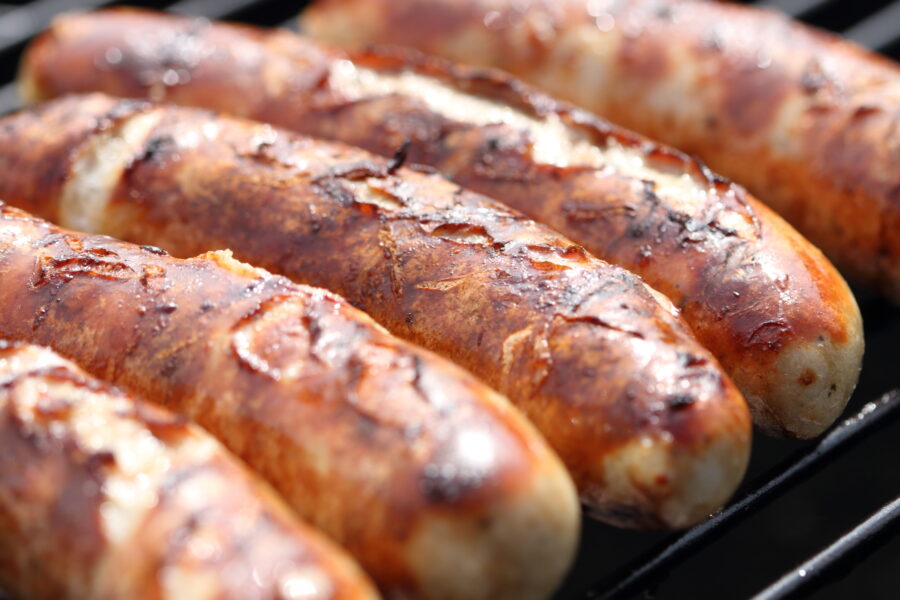 sausages on charcoal grill