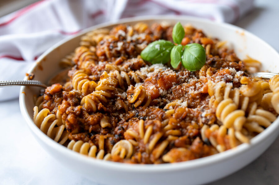 vegan meal with lentil bolognese and fusilli pasta.