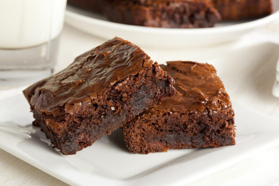 Fresh Homemade Chocolate Brownie against a background