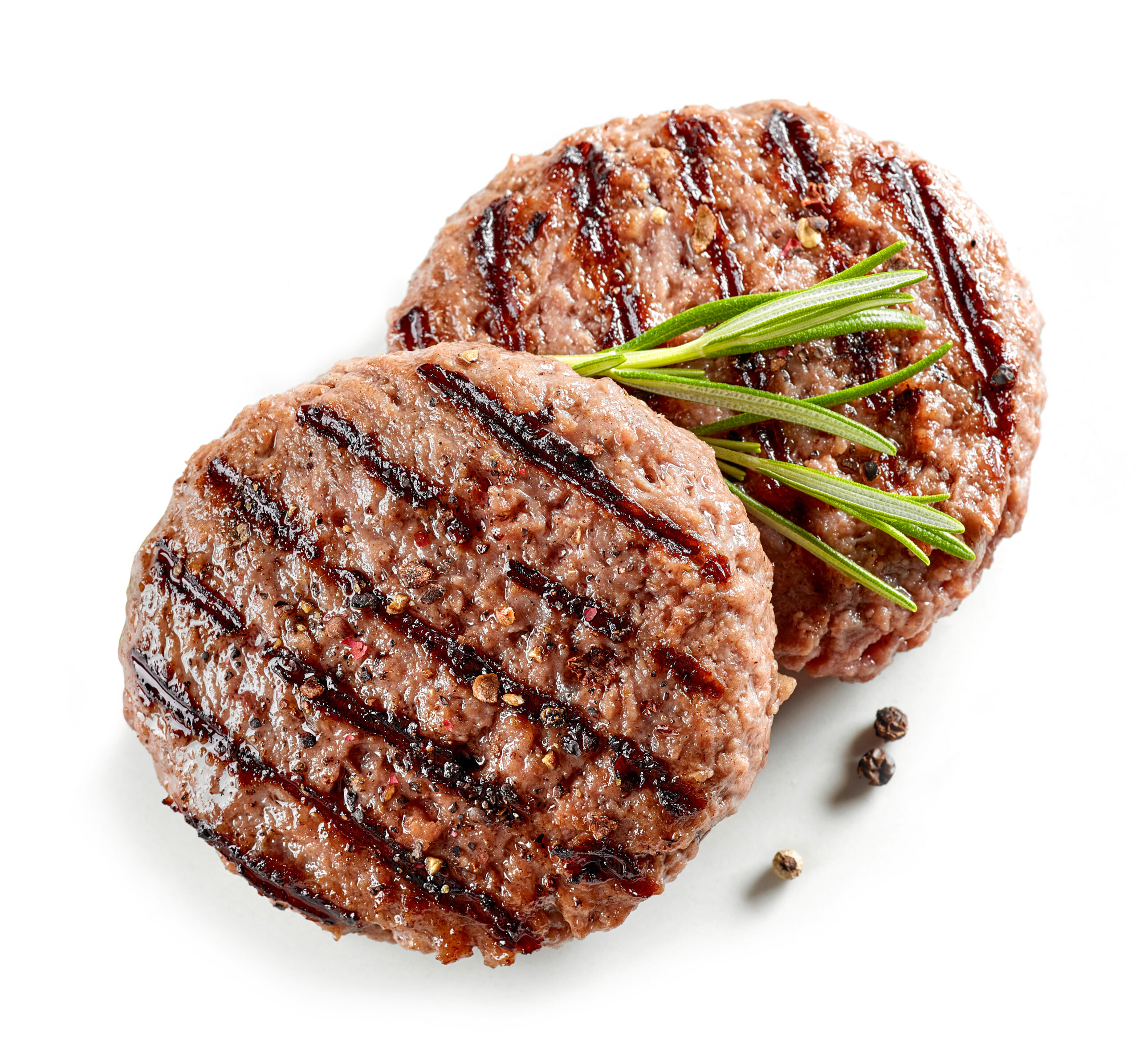 freshly grilled burger meat isolated on white background, top view