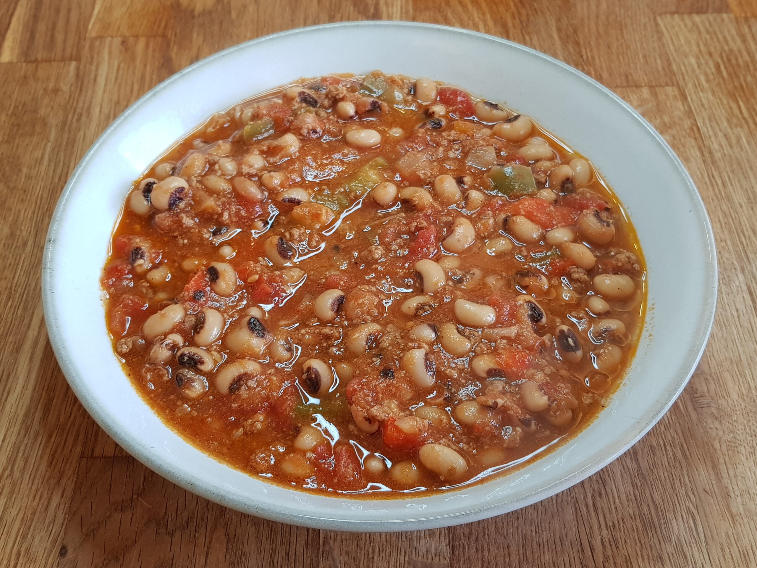 Side view of black eyed beans stew, Turkish food, kiymali borulce served at Glasgow Scotland England UK