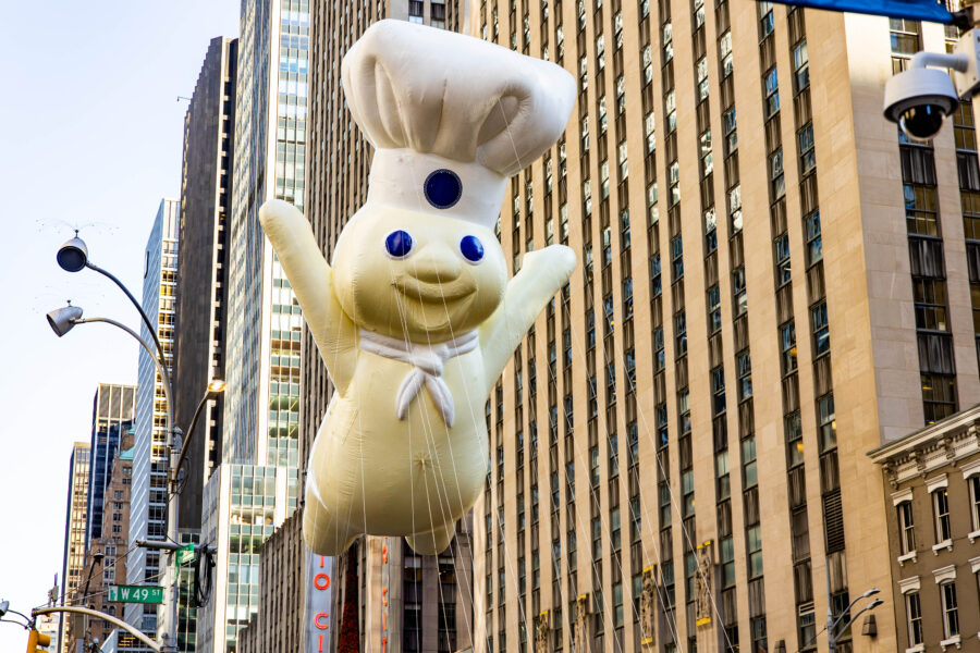 New York, USA - November 24, 2022: Annual Thanksgiving Macys parade with inflated Pillsbury Doughboy character