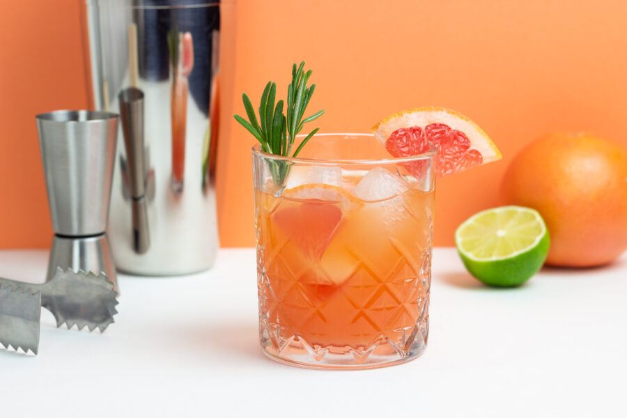 Paloma cocktail with grapefruit, lime and rosemary. 