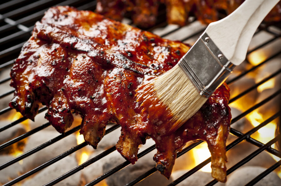 Rack of baby back ribs on the grill.  