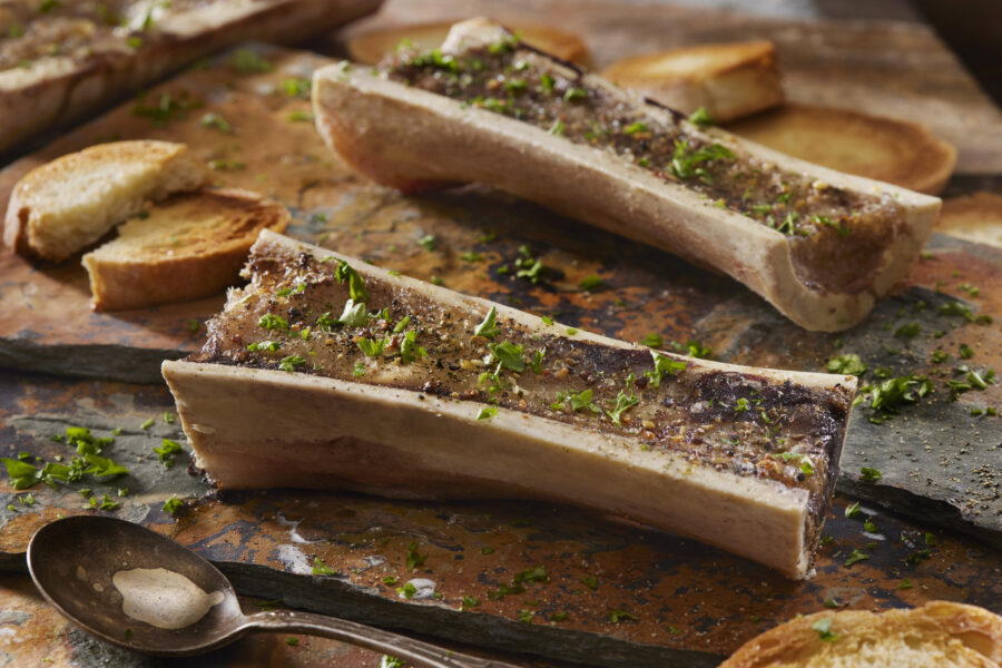 Roasted Beef Bone Marrow seasoned with Salt, Pepper and Toasted Crostini's