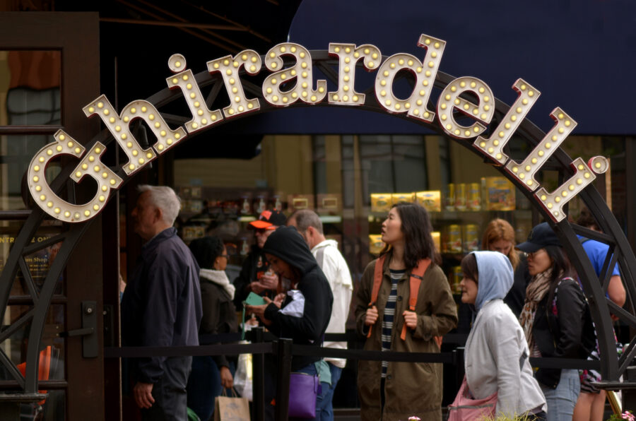 San Francisco, California, USA - May 19, 2015: Line of people in Ghirardelli Chocolate Company Shop at Ghirardelli Square in San Francisco, California. Incorporated in 1852 Ghirardelli Chocolate Company is the third oldest chocolate company in the United States.