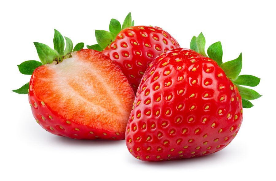 Strawberry whole and a half on white background. 