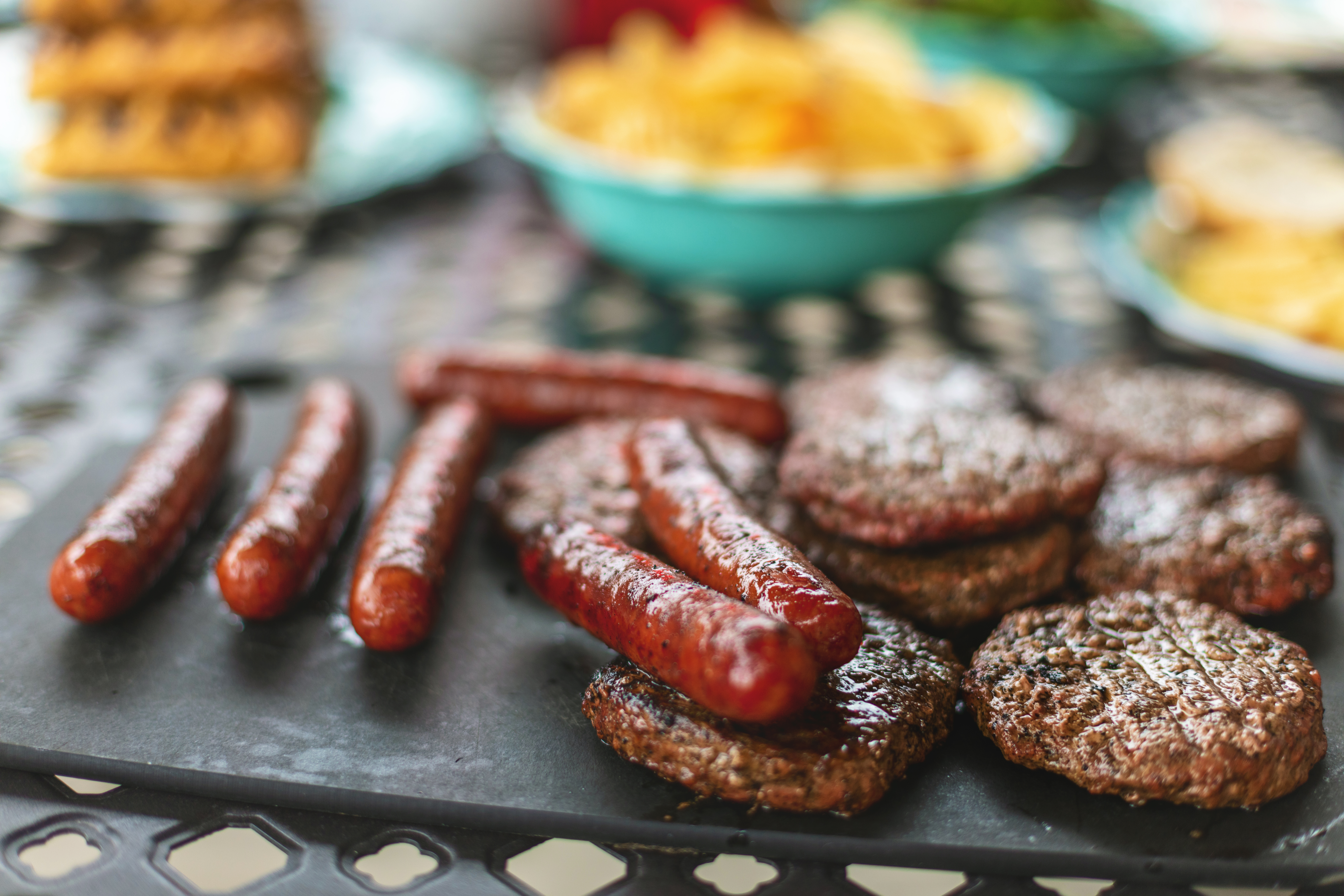 Summer Celebration Outdoor BBQ Grill Cooking Grilled Beef Burgers and Bratwurst Bangers Western Colorado Matching 4K Video Available (Professionally retouched - Lightroom / Photoshop - downsampled as needed for clarity and select focus used for dramatic effect)