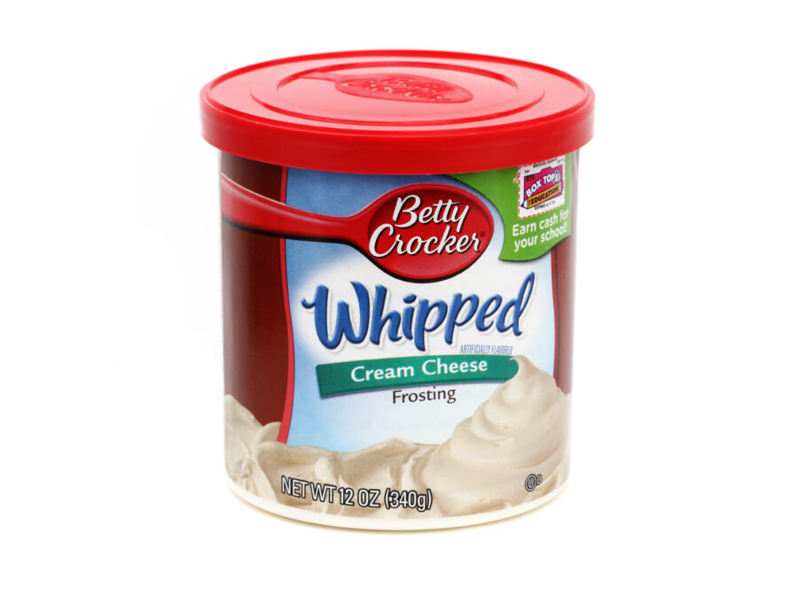 West Palm Beach, USA - April 16, 2012: This is a studio shot of a container of Betty Crocker Whipped Cream Cheese Frosting.  The frosting is ready made and ready to spread on your cake or cupcakes. Betty Crocker is owned by General Mills.