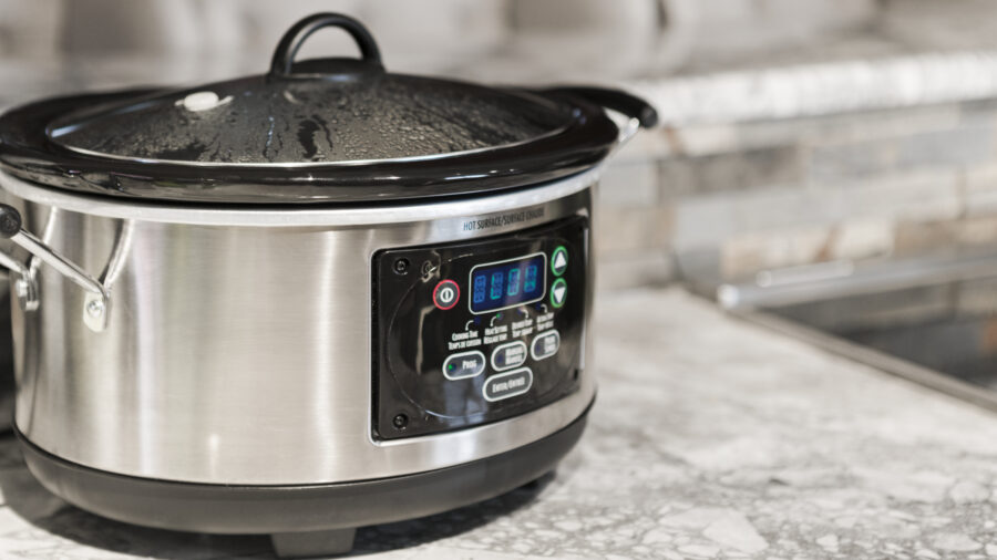 Food cooking in a slow cooker.