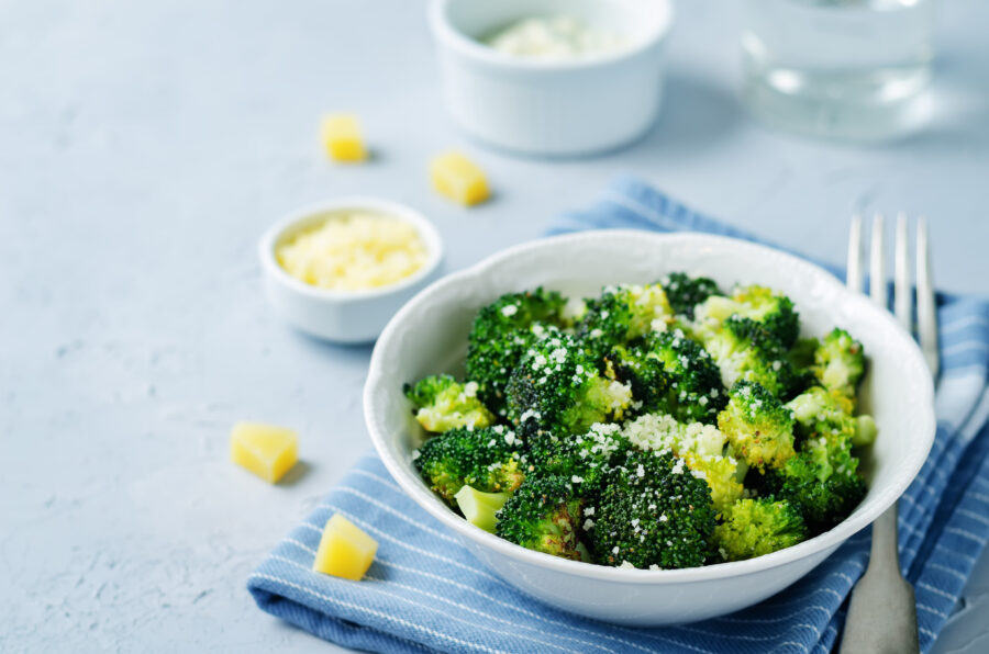 Garlic Parmesan Roasted Broccoli on a stone background.