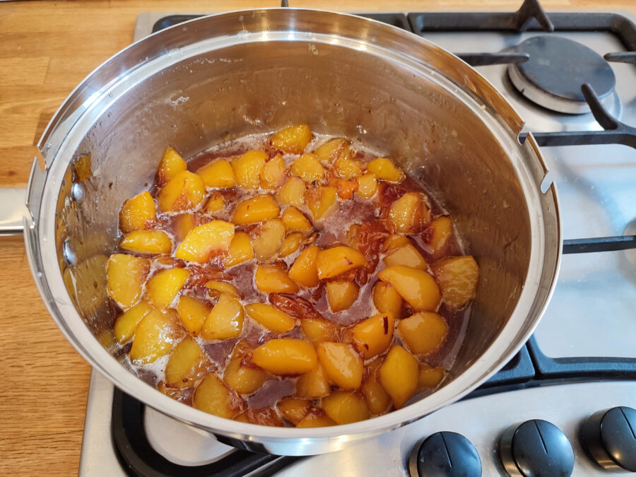 Homemade peach jam in pan