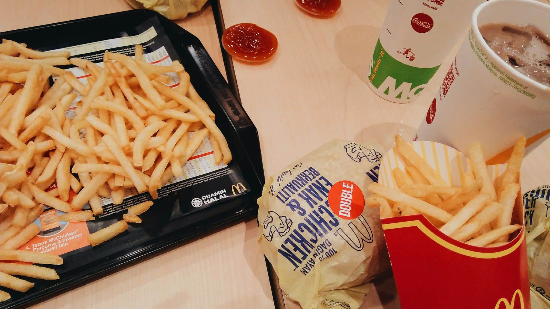 McDonald's fries in a red container on a table