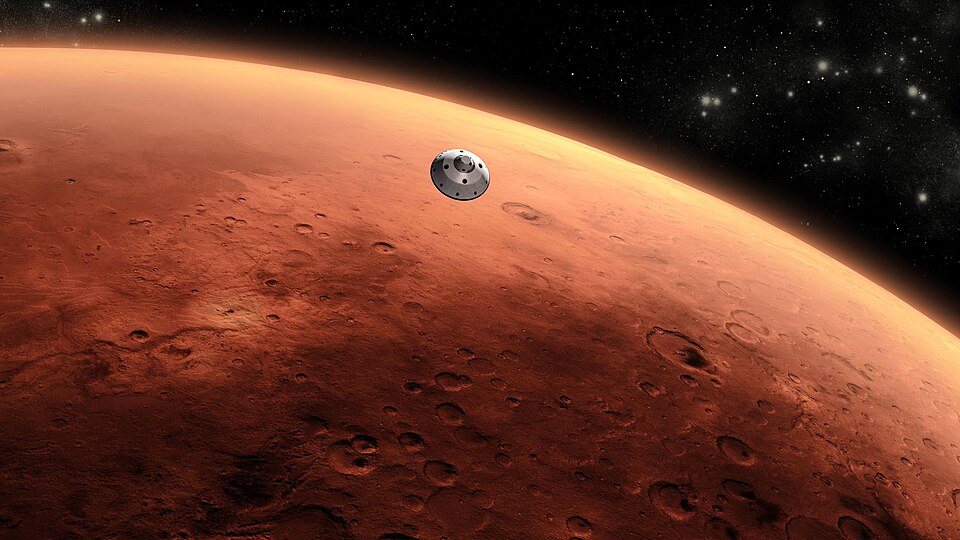 A spacecraft or probe hovers above the red, cratered surface of Mars, with the black expanse of space and distant stars in the background.