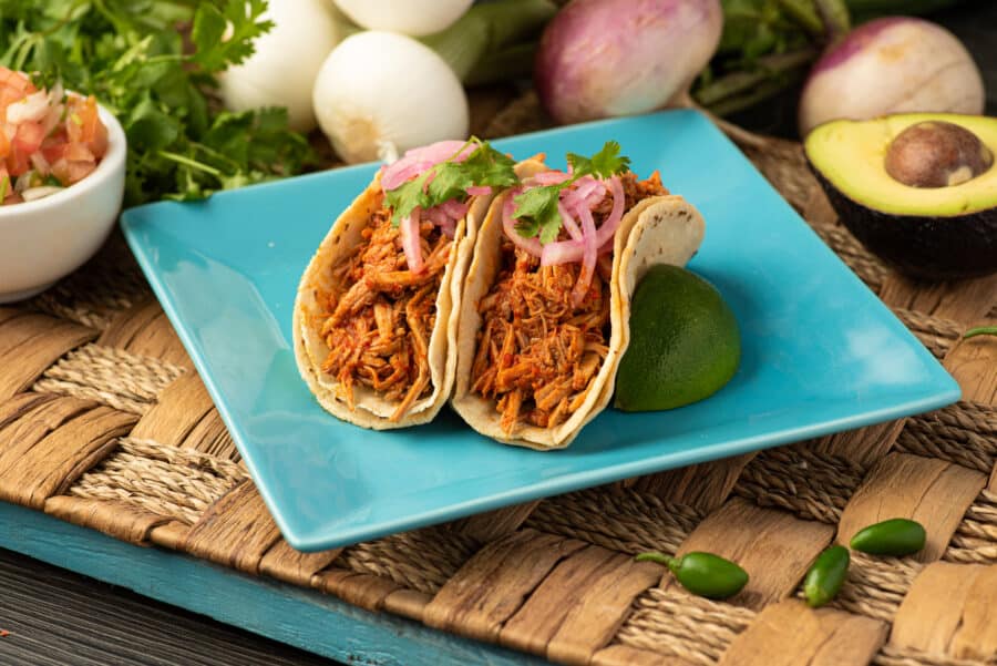 Mexican cochinita pibil tacos. Tacos mexicanos de cochinita pibil