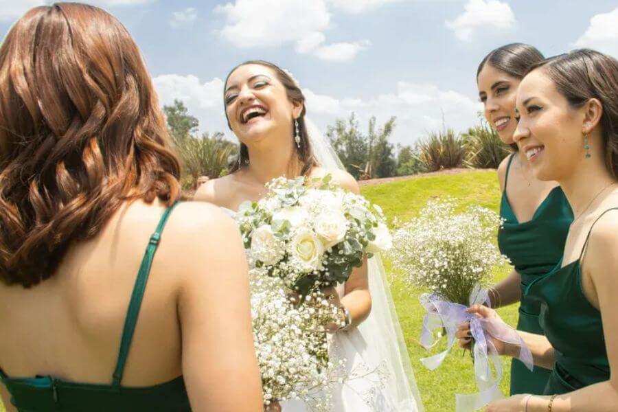 wedding brid taling to maids of honors