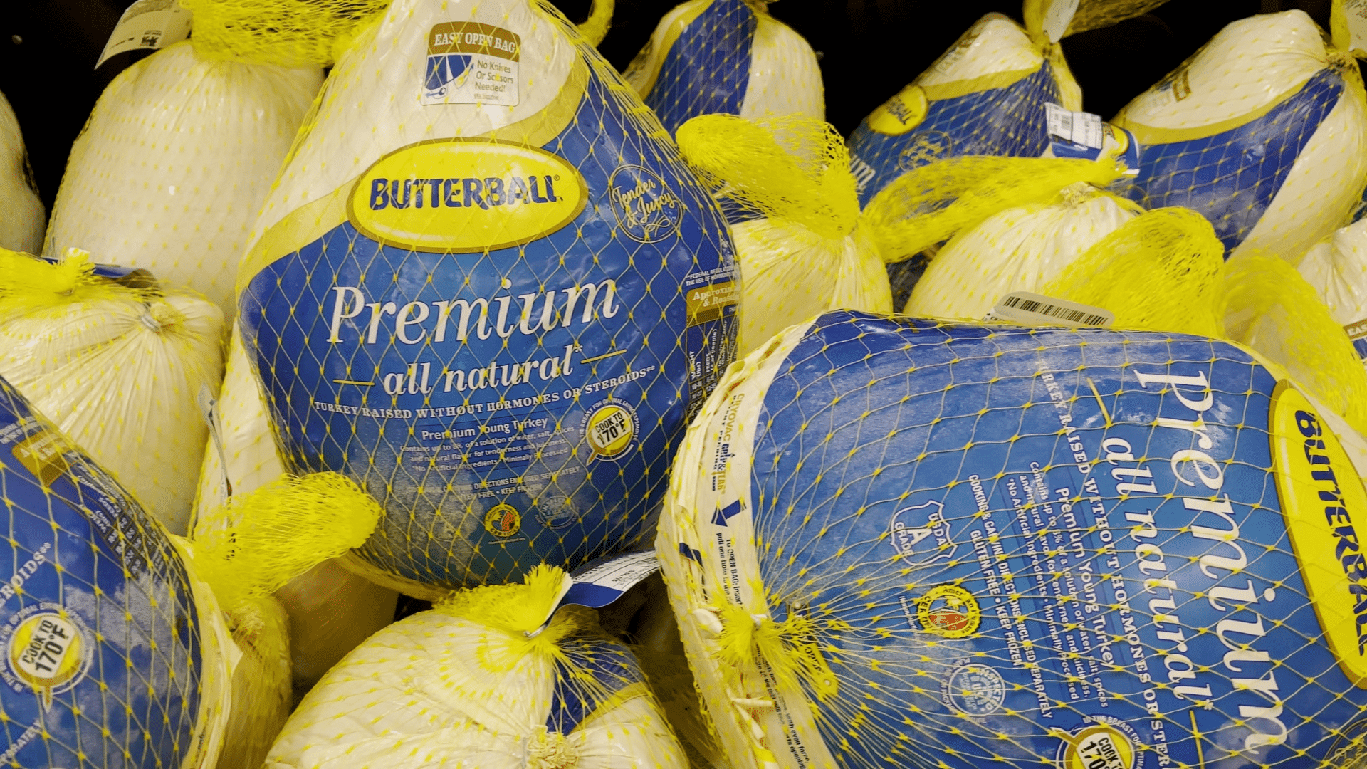 Butterball turkey processing plant exterior with trucks parked outside