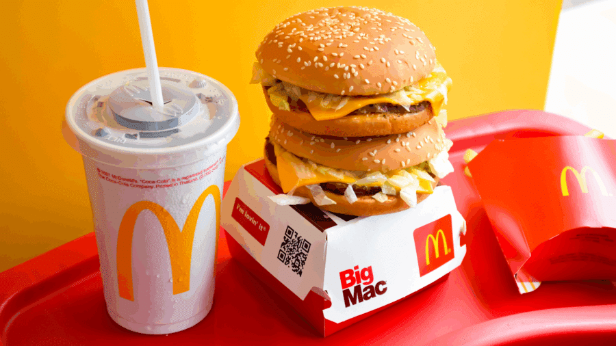 Double Big Mac sandwich served in McDonald’s box on tray